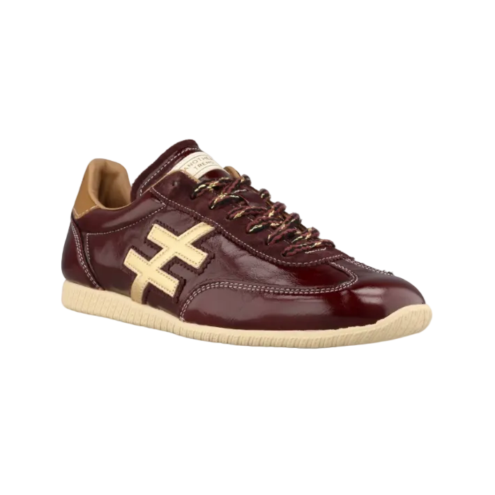 Another Trend women's burgundy patent fashion trainer