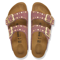 A pair of Birke double-strap slide sandals in dusty mauve with gold-tone buckles and gold polka dot accents on the straps, shown from a top-down view on a white background.
