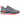 Grey and orange athletic trainer shoe with mesh panels and textured sole, side view
