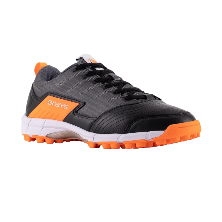 Black and orange sports shoe with textured sole, mesh upper, and lace-up design