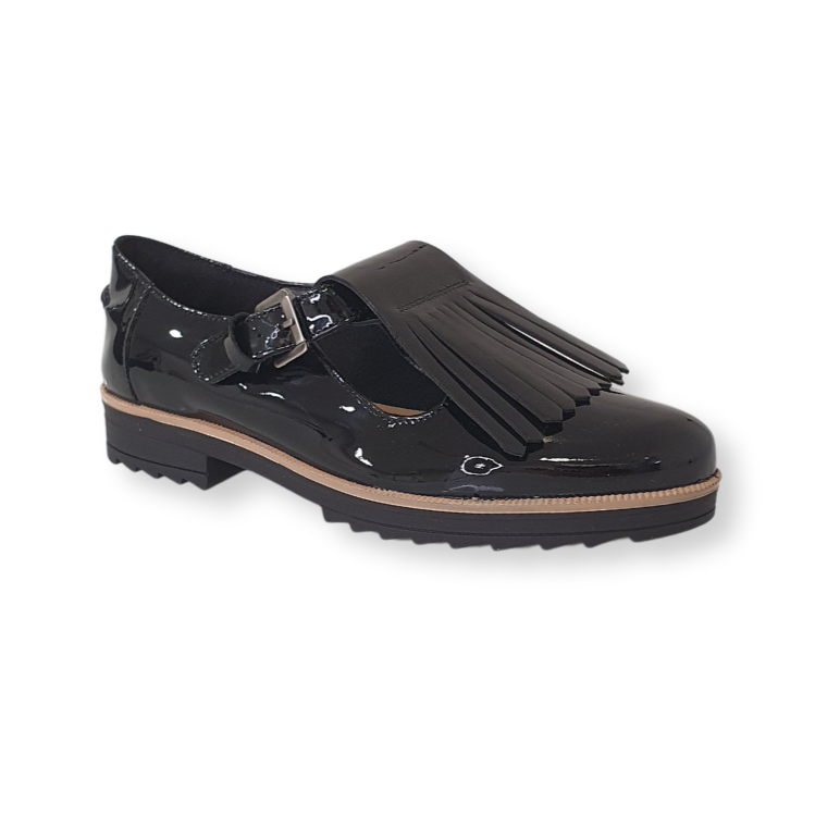Black patent leather loafer with fringe detail, buckle strap and chunky sole