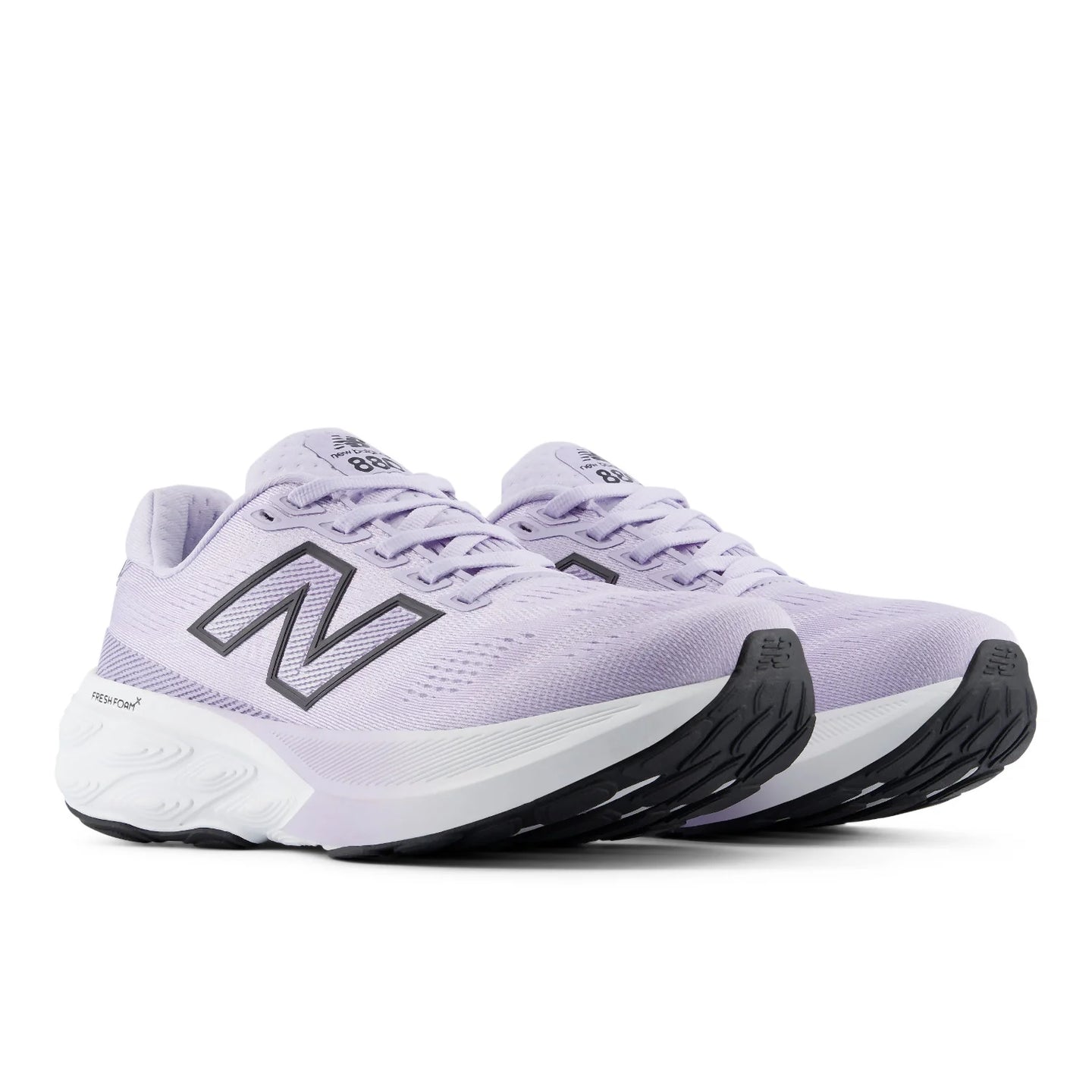 New Balance women's purple and black trainer