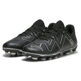 Black football boots with silver accents, lace-up design, and studded soles for firm ground