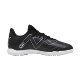 Black and silver turf football shoe with white sole, side profile, athletic footwear