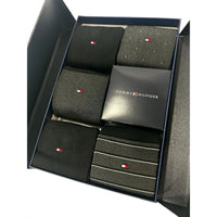 Gift box set of black men's socks with assorted patterns and logo branding