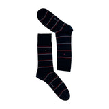 Navy blue striped socks with red and white accents, laid flat on a white background